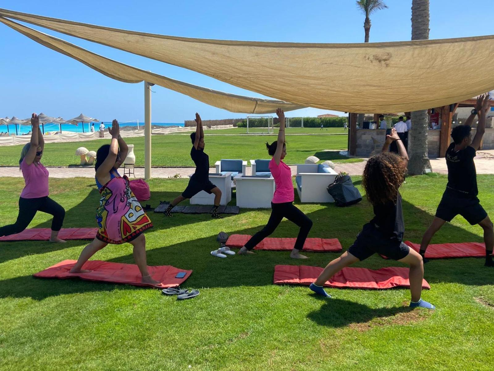 Borg El Arab Beach Resort Esterno foto A yoga class in Egypt